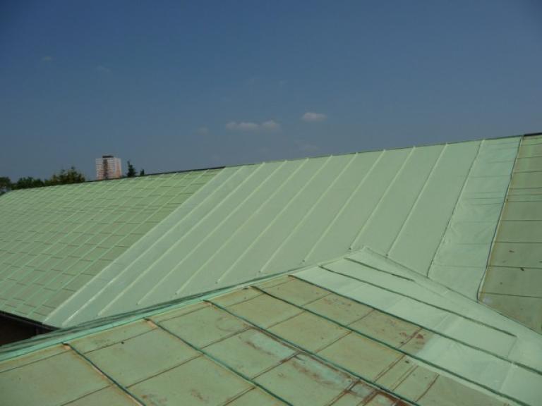 The roof area being coated with copper verdi green membrane