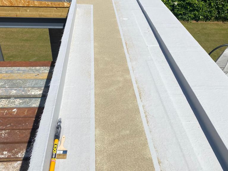 The sanded down roof prior to polymer installation