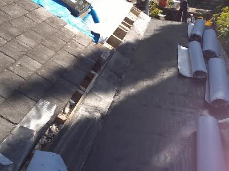 The area to be roofed was a flat roof area running alongside a new pitched roof