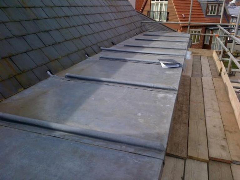 Removing the lead from the back of the dormer roof