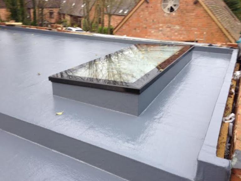 Warm roof with raised skylight