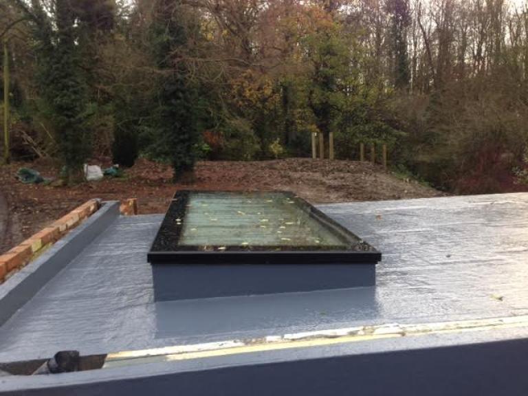 The skylight is snug and fully water resistant right up to its edges