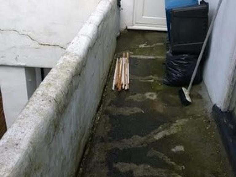 This balcony was leaking and waterlogged