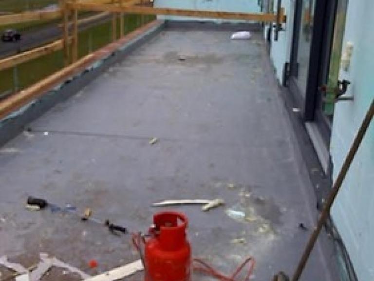 Insulation extending around the corner and onto the seaward west-facing side