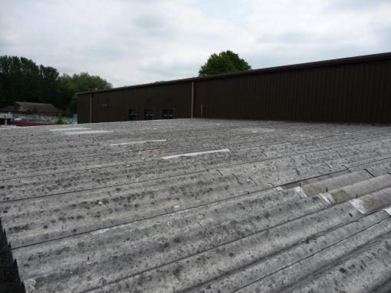Before - Asbestos cement profile roof in Northeast Manchester