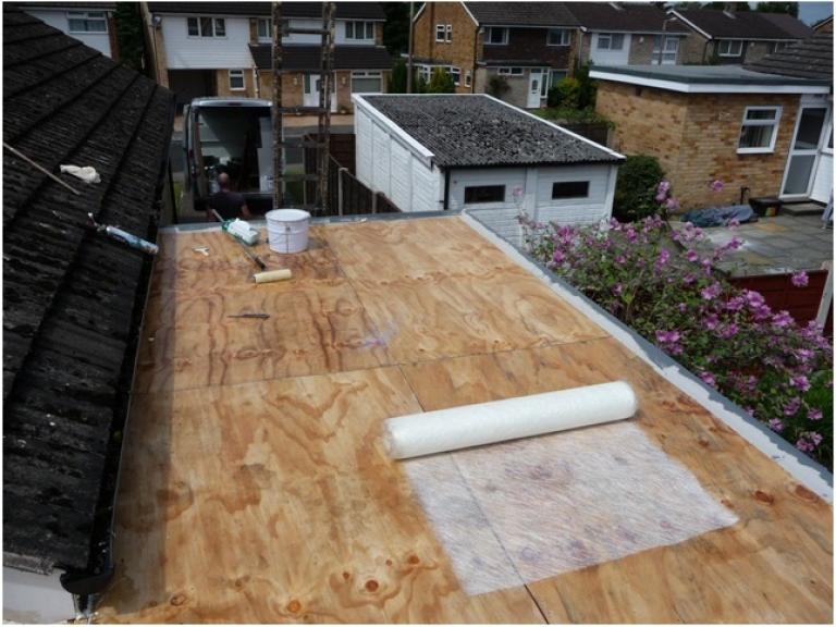 Overboarding added to existing roof to upgrade strength, then a smooth deck finish
